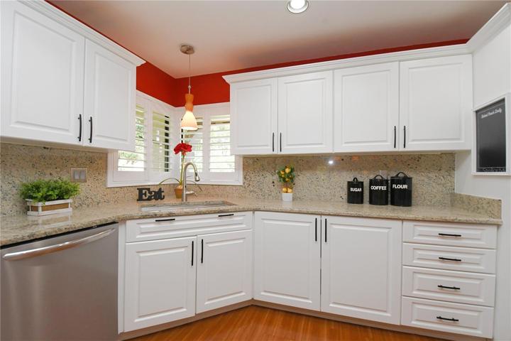 Corner sink with windows above.