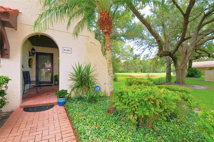 Serenity greets you at the doorstep with an arched, covered entryway lined with stately brick pavers that herald a grand entrance.