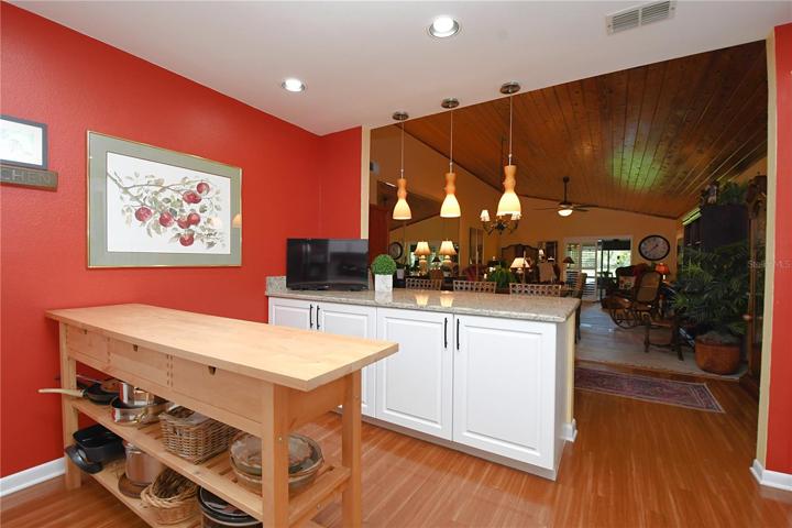 The kitchen is open to the dining and living room.
