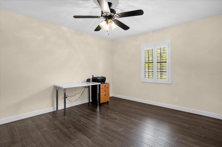 Bedroom 2 with Custom White Plantation Shutters