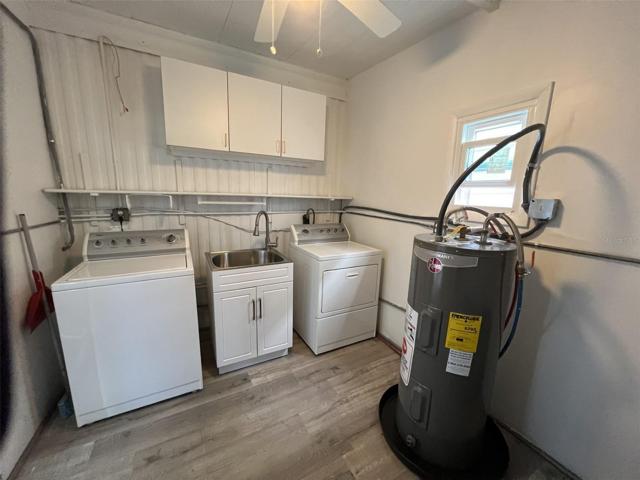 Laundry Room.  Brand new appliances, water heater and stainless steel sink.