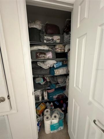 linen closet to the right of HVAC