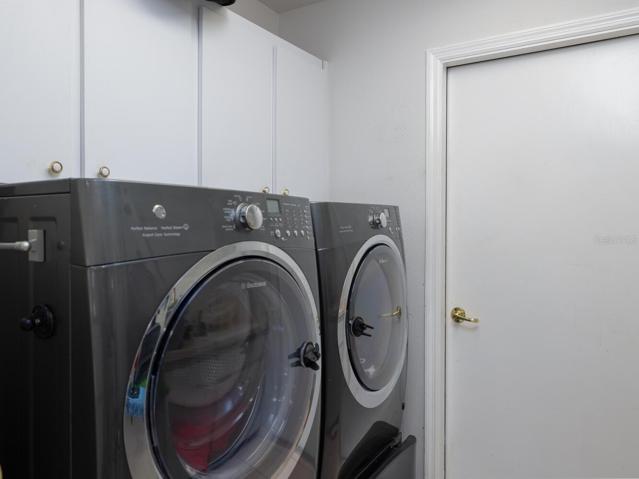 Laundry room leading into the garage off the kitchen