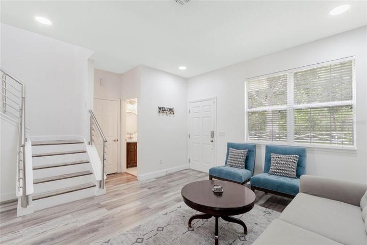 Fresh paint, new flooring, updated stairs.