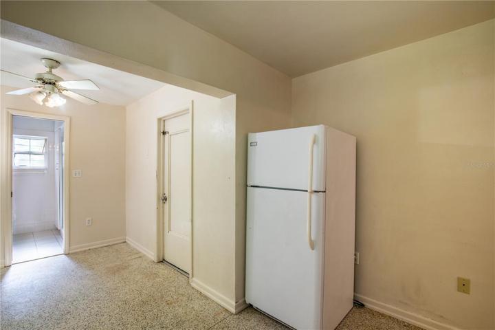 Kitchen looking into Dining Room - door into garage.