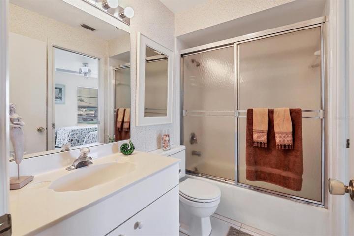 Hall bathroom with Jack & Jill door to second bedroom