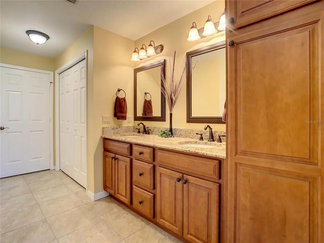 Linen closet in the forefront of the picture.