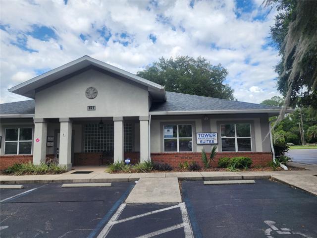 Building located on Tower Road at intersection of West University Ave (which goes behind Home Depot)