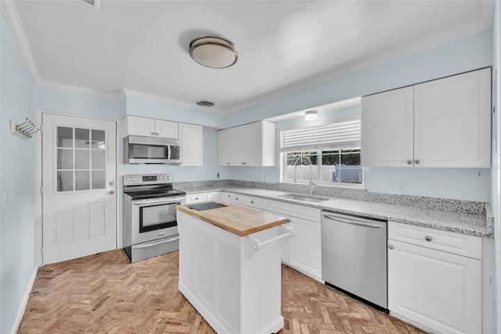 Kitchen Island and Door to Single Garage