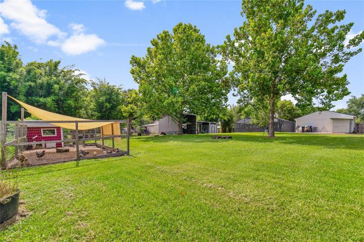 An additional SHED and CHICKEN COOP complete the backyard, providing endless storage and a fresh breakfast every morning!