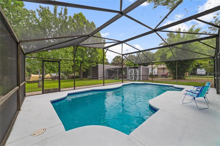 The SCREENED POOL is a staple in Florida and this one was recently resurfaced and the enclosure re-screened!