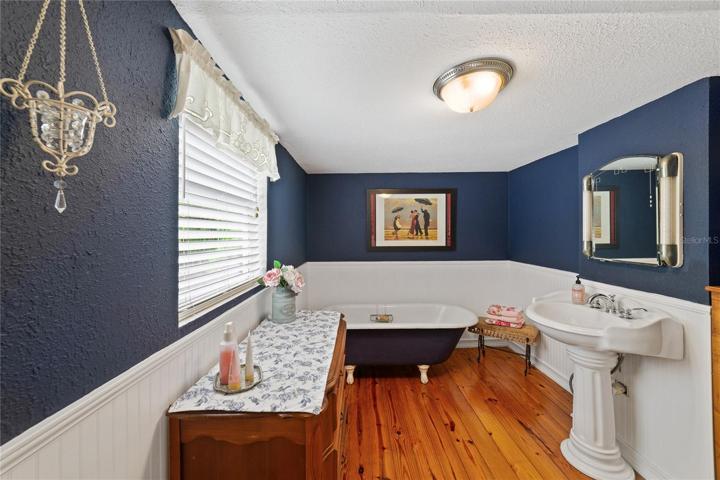 The oversized bedrooms offer versatility and room to grow and the second floor bath houses an original clawfoot tub from the Standard Company dated 1914!