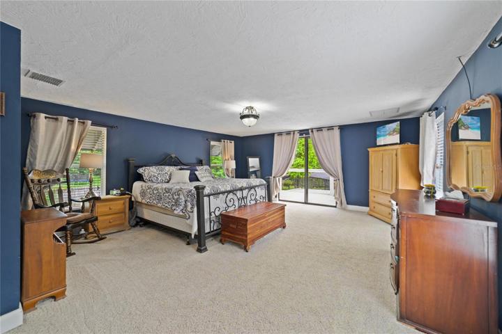 Your primary bedroom delivers a must have walk-in closet, private balcony and is situated directly next to a large closet already plumbed for a private en-suite or third full bath!