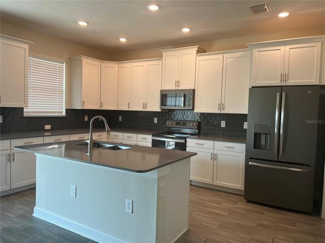 Open kitchen with eating area