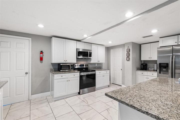 Laundry room on left, Walk-in Pantry on Right