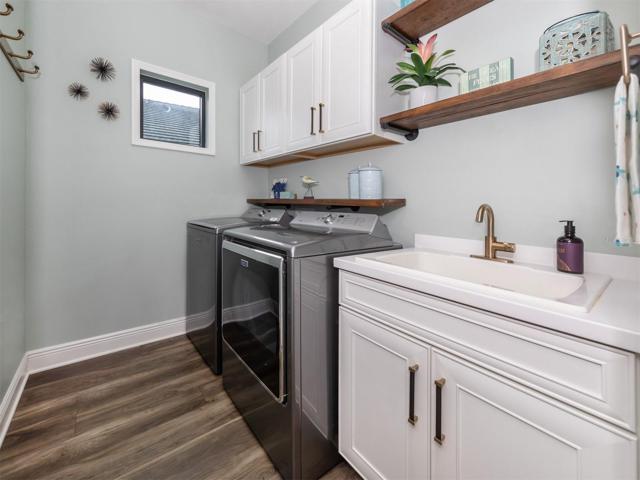 Laundry Room with Sink and cabinets for more storage