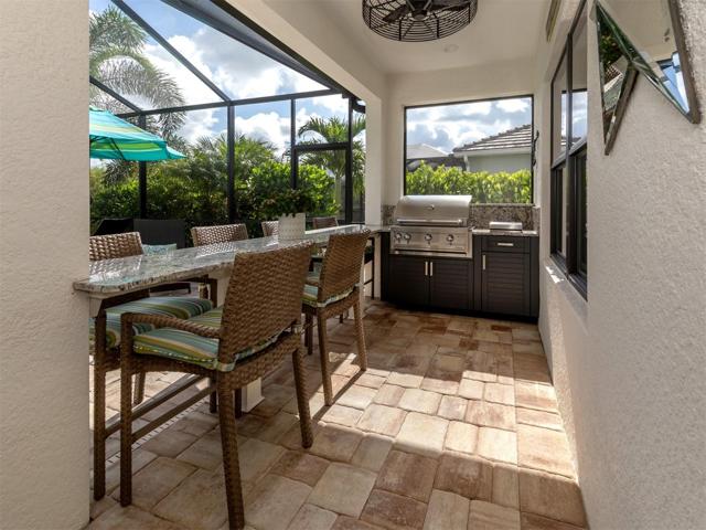 Outdoor Kitchen With Seating for 7.