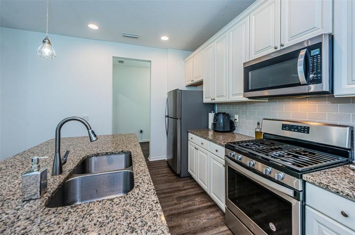 Stainless Gas Range, Refrigerator and Microwave