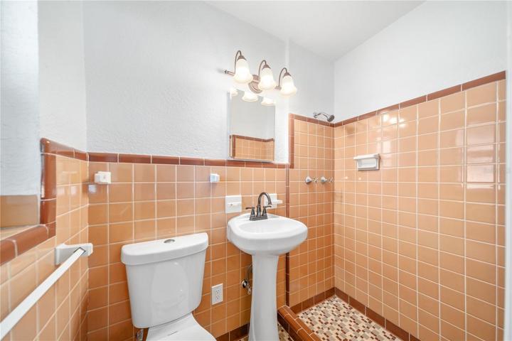Primary bath with step in shower