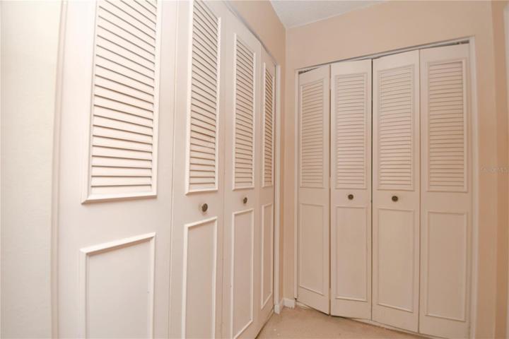 The master bedroom offers a true sanctuary with two spacious built-in closets. You will also have plenty of storage space with an additional walk-in closet in the hallway, perfect for all your needs.