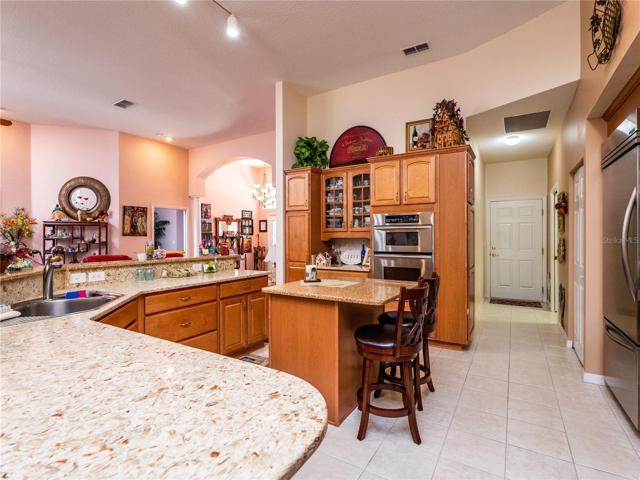 ISLAND & HALLWAY TO GARAGE