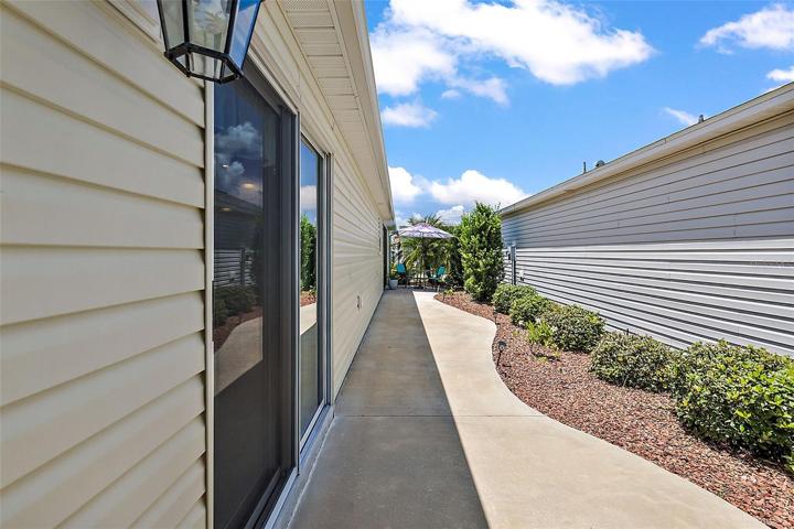 Side Patio w/ Access to Dining Area