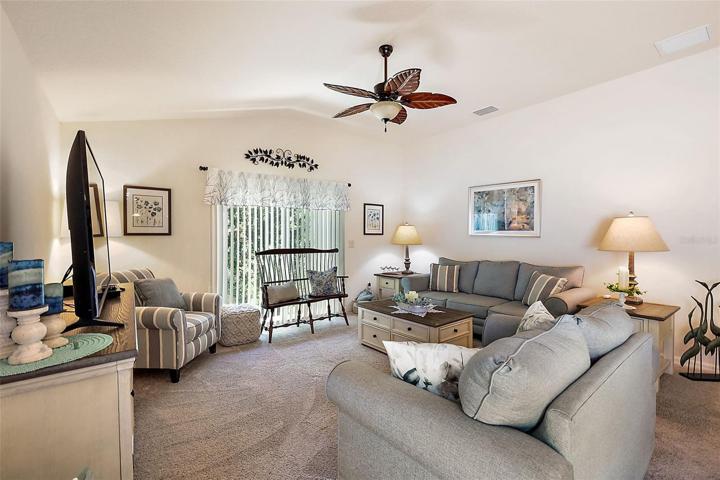Living Area w/ Vaulted Ceiling & Upgraded Ceiling Fan