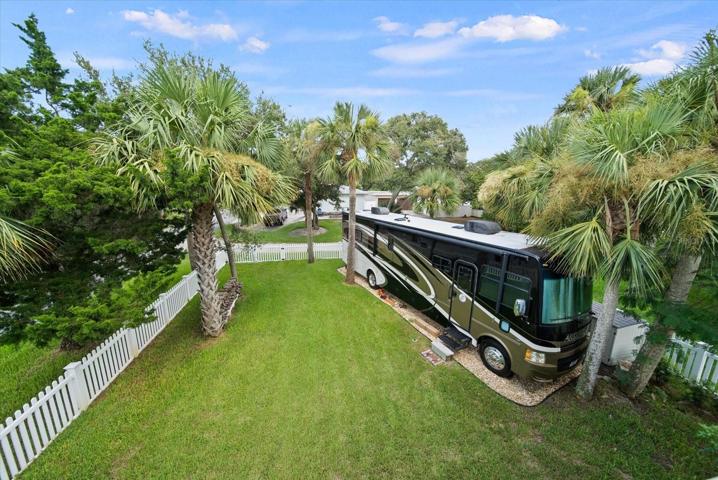 Large fenced yard with RV parking and 30 amp electric