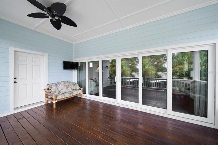 Upper-level deck with sliding glass doors to Main Living