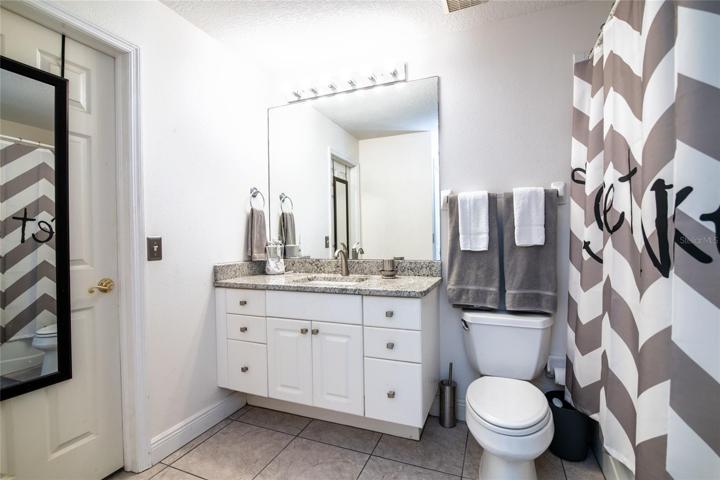 Bathroom - shower/tub and walk-in closet on left