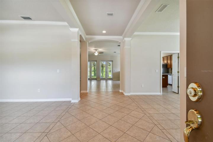 Diagonal offset tile in Foyer between the living and dining areas