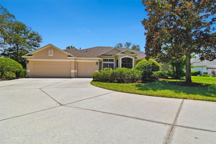 Huge Driveway, 3 car garage, and screened front porch with security door