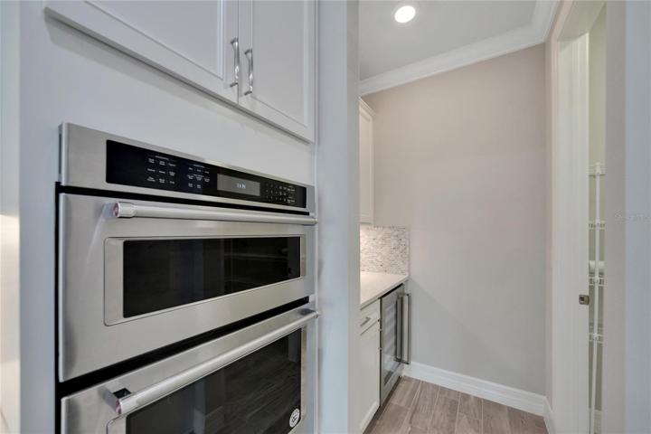 entertainment kitchen with wine refrigerator