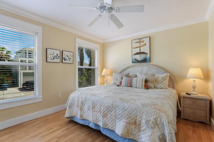 King bed in bedroom #1 and small walk in closet