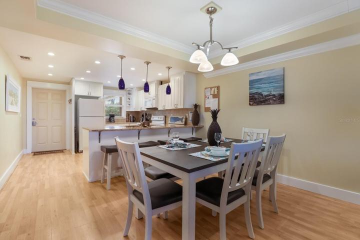 Kitchen is open to dining room.  Crown molding in the dining room