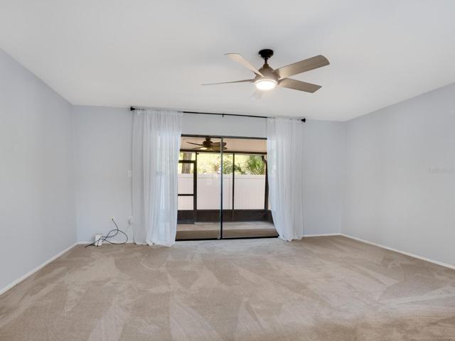 Family room looking onto large screened lanai