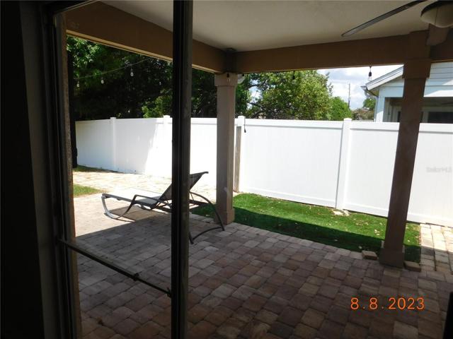 Lanai w/fenced back yard