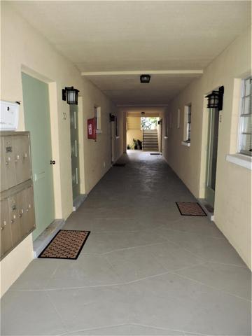 Covered Hall Entrance to Units