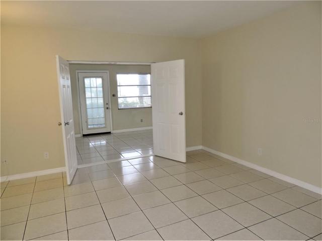 Living Room Leading to enclosed Porch