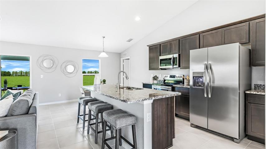 KITCHEN *DISCLAIMER: Renderings, Photos, Virtual Tours are of like model and are used for display purpose only, actual property may vary.