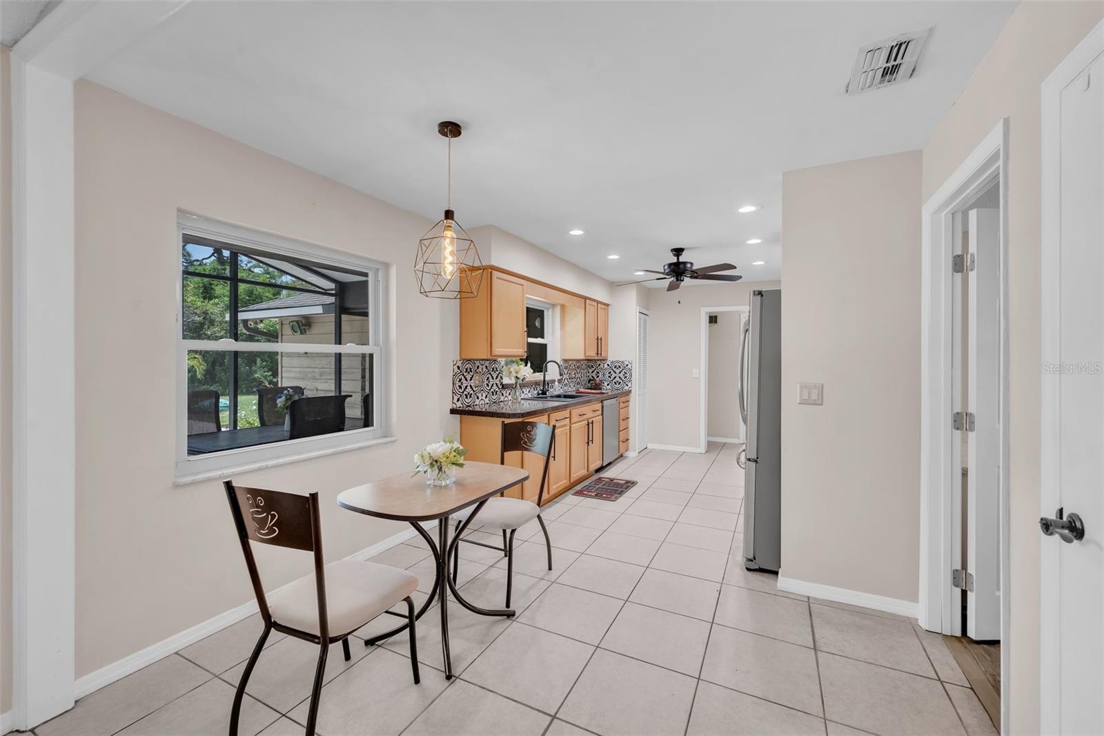 The kitchen is spacious with TWO pantries and even has an area for a small table.