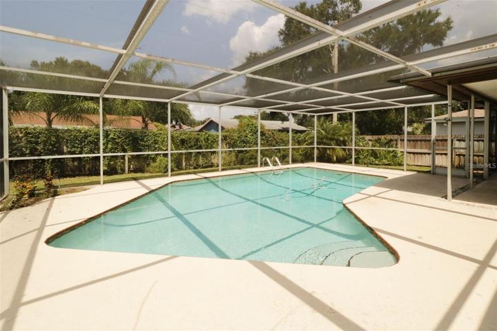 Pool with screened enclosure