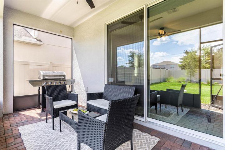 Sliding Doors leading out to screened-in lanai