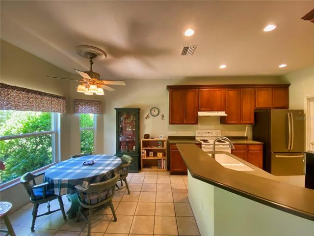 Dinette Area with Tile Floor and Breakfast Bar