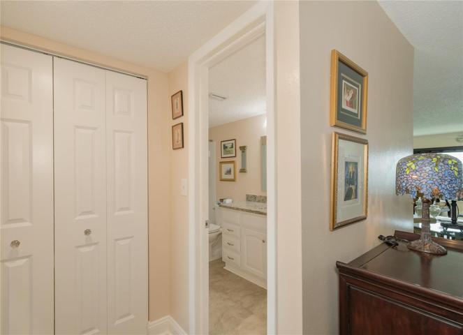 Guest bath opposite the dining area/kitchen