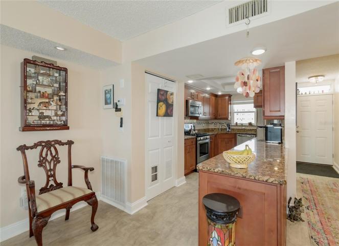 The kitchen is in the front of the home (see front door to right).