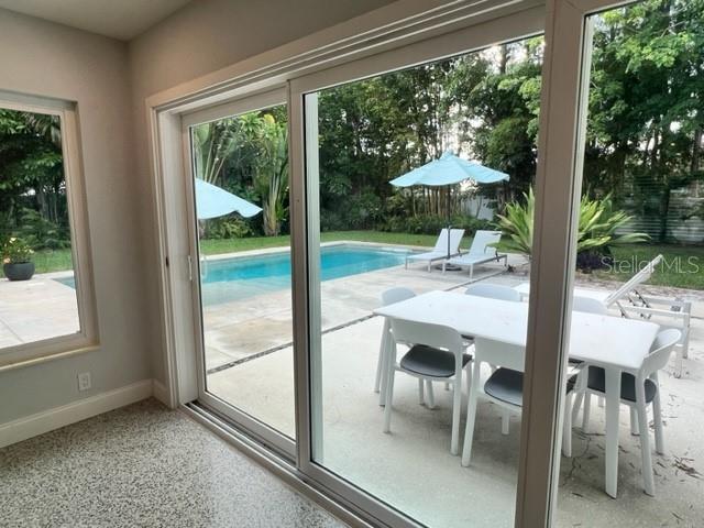 Looking out to Patio and Pool Backyard