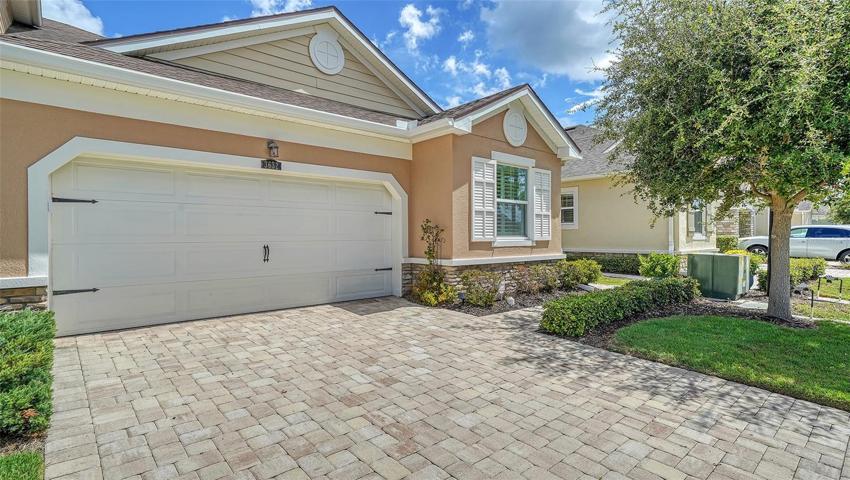 Attached, Single-story, end unit townhouse