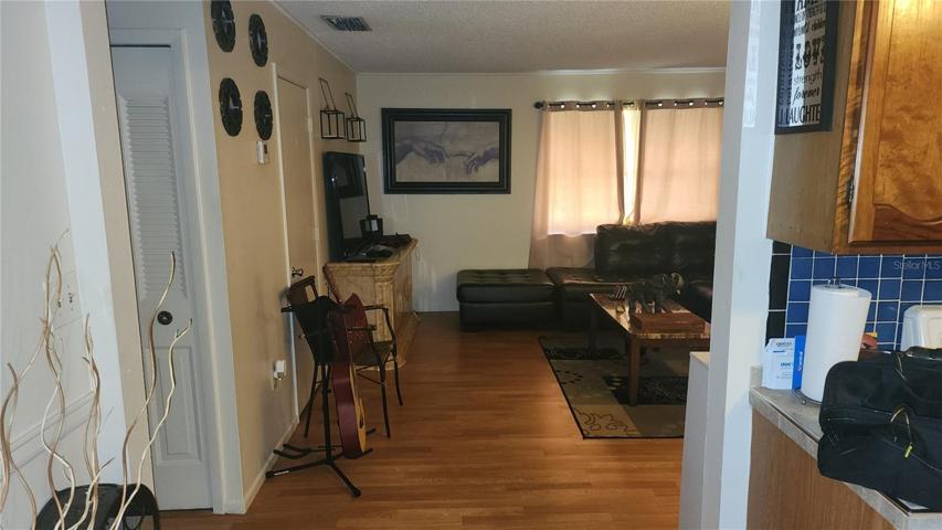 Unit 19: View of living room from eat-in space