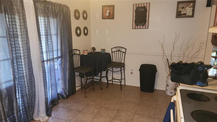 Unit 19: Eat-in space & doors to screened porch
